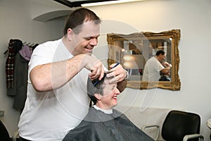 A haircut for a lady at the barbers
