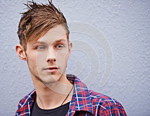 Haircut, thinking and male person for beauty, trendy and hairstyle on studio background. Face, contemporary and spikes