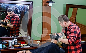 Haircutting is an art. moustache and beard. sit in chair at hairdresser. mature man at hairdresser. Hair care and male