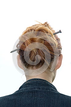 Hairdress with a metal nail