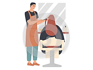 The hairdresser applies dye to the hair of the client. Hair dyeing, Hair coloring