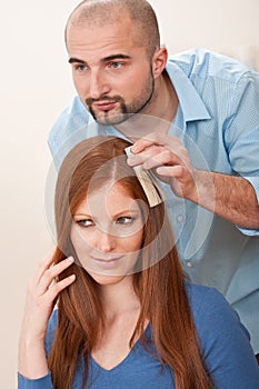 Hairdresser choose hair dye color at salon