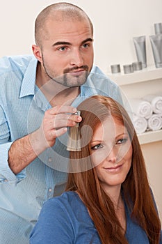 Hairdresser choose hair dye color at salon