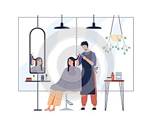 Hairdresser cutting clients hair in salon. Hairstylist doing haircut with scissors for woman customer in chair