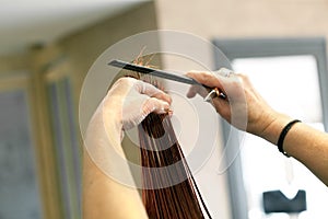 Hairdresser Cutting Hair Ends