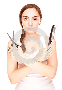 Hairdresser holding a scissors and comb