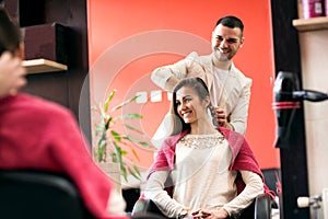 At the hairdresser`s, woman getting her hair done in the beauty