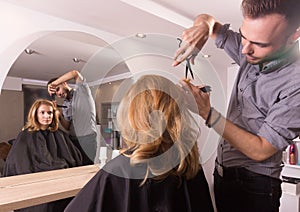Hairdresser salon mirror cutting hair scissors comb