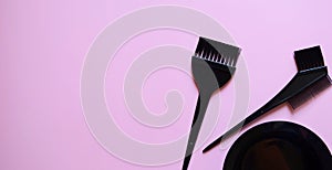 hairdressing brushes on pink background, hair coloring kit, beauty salon banner, pink background
