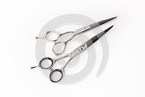 Hairdressing different scissors isolated on white background