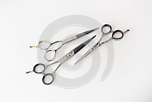 Hairdressing different scissors isolated on white background