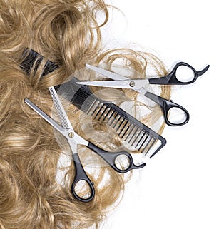 Hairdressing scissors with blonde hai