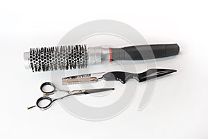 Hairdressing scissors, comb and blade isolated