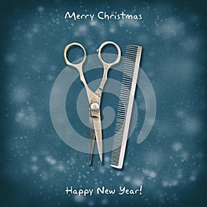 Hairdressing scissors and comb on a dark background. Happy New Year and Merry Christmas. Greeting card for hairdresser
