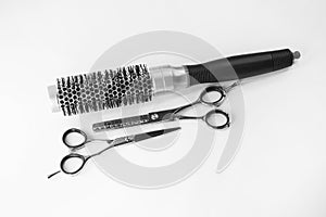 Hairdressing scissors and comb isolated