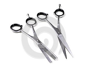 Hairdressing scissors isolated on a white background. Hair cutting scissors. Thinning shears. Professional shears