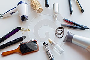 Hairdryers, irons, hot styling sprays and brushes