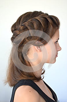 Hairstyle braiding on medium length