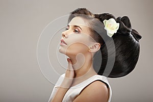 Hairstyle Contemporary Design. Sensual Woman with Creative Coiffure. Glamor