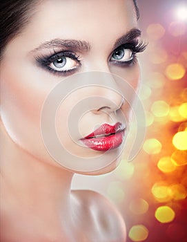 Hairstyle and Make up - beautiful female art portrait with beautiful eyes. Elegance. Genuine Natural brunette in studio