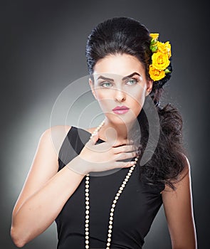 Hairstyle and Make up - beautiful female art portrait with yellow roses