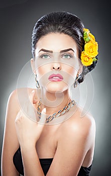 Hairstyle and Make up - beautiful female art portrait with yellow roses