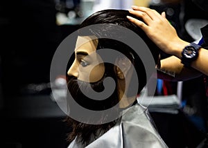 Hairstyles on dummy head of hair salon