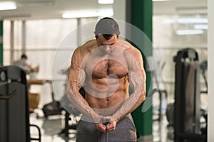 Hairy Bodybuilder Flexing Muscles