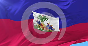 Haitian flag waving at wind with blue sky, loop