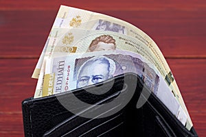 Haitian money in the black wallet