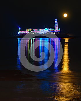 Haji Ali Mosque lit for New Year with Full Moon set