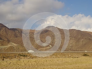 Hajjar Mountain range and sky - Khorfakkan, United Arab Emirates