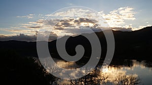 Hakarimata ranges winter sunset beside waikato river