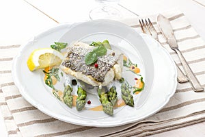 Hake fillet with asparagus foam sauce photo