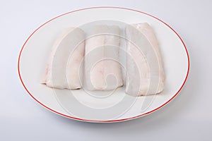 Hake steaks on plate