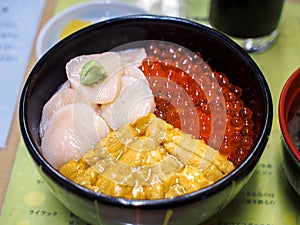 Hakodate, Hokkaido, Japan - Kaisen don, a Japanese traditional rice bowl dish topped with Thinly-sliced sashimi and fish roe.