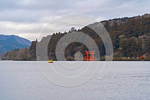 Hakone Jinja Heiwa no Torii with lake in Hakone old town, Kanagawa, urban city in Japan. Architecture landscape background