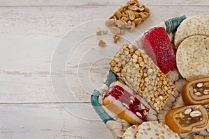 Halawet Al Mawlid - Collection of Beans Candies and Sweets on wooden table