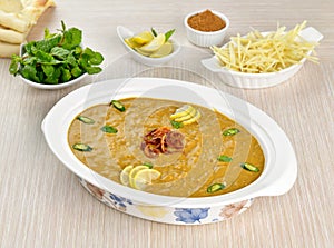 Haleem is a delicious food. Prepared with meat, lentils, grains and cook on low heat.