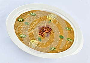 Haleem is a delicious food. Prepared with meat, lentils, grains and cook on low heat.