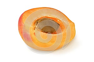 Half of apricot on an isolated white background