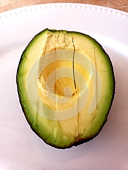 Half of a avacado sliced