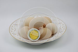 Half boiled Eggs and Fresh Eggs Packed in ceramic bowl