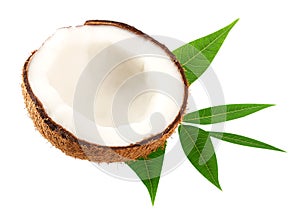 Half of coconut with green leaves isolated on white background