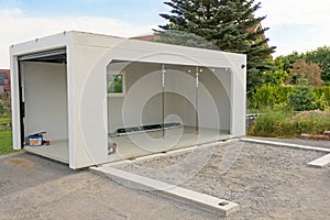 Half of a concrete double prefabricated garage