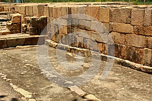 Half constructed stone block wall in the Brihadisvara Temple in Gangaikonda Cholapuram, india.