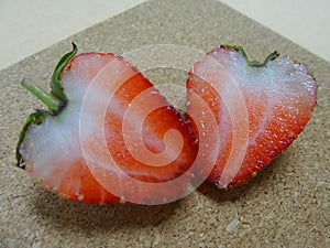 Half cut fresh red strawberry