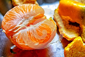 Half cut orange fruite and its skin