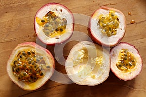 Half cut passion fruit on wooden background. Fresh passion fruits-Healthy fruit and special taste