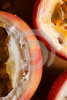 Half cut passion fruit on wooden background. Fresh passion fruits-Healthy fruit and special taste